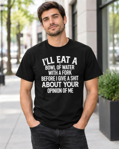 Man wearing the I'll Eat a Bowl of Water funny graphic tee on a city sidewalk